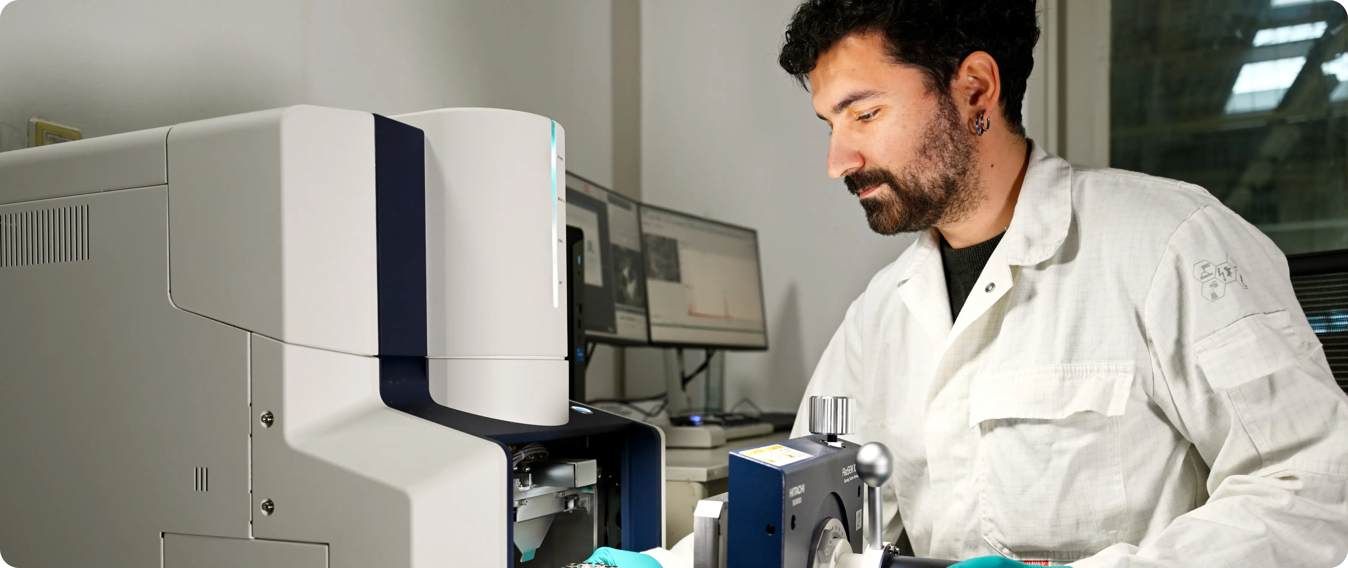 Researcher working with analysis equipment in the Alquion lab