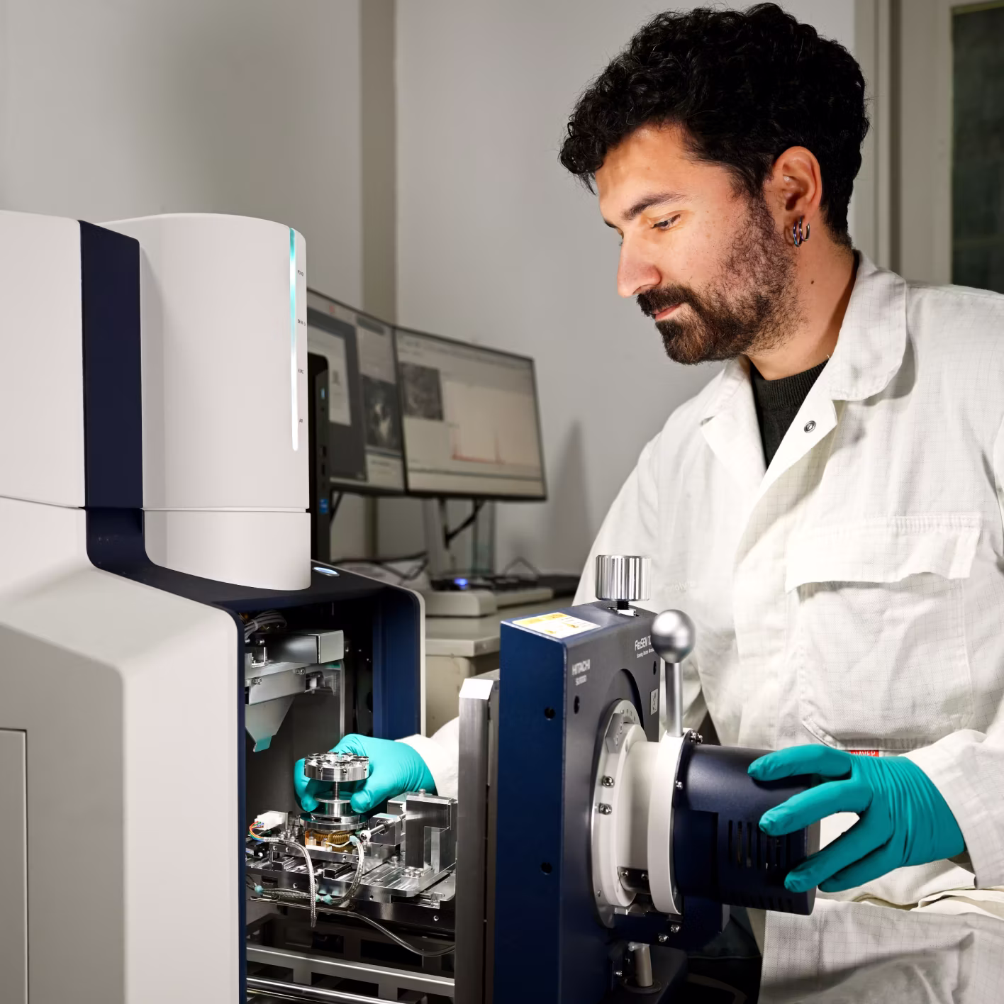 Researcher working with analysis equipment in the Alquion lab